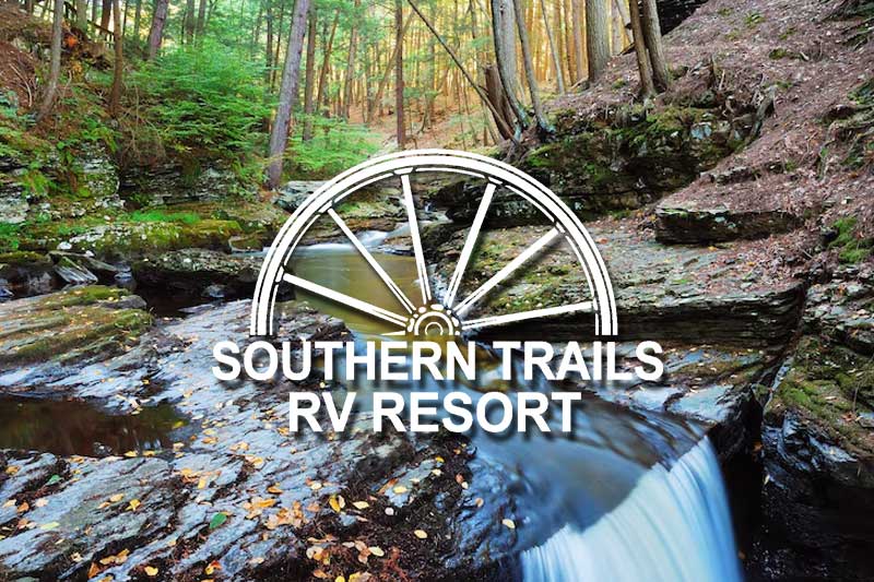 Southern Trails RV Resort Campground Membership Resales A stylized Southern Trails RV Resort logo badge on a clean background, representing pre-owned campground membership resale options for nationwide RV travel.