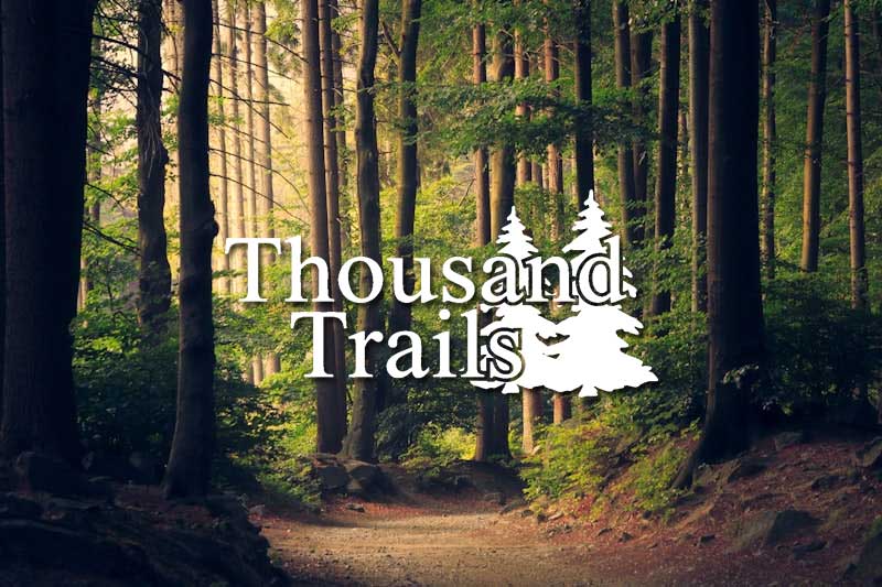 Thousand Trails Campground Membership Resales A stylized Thousand Trails network logo badge on a clean background, representing pre-owned campground membership resale options for RV travel.
